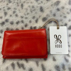 HOBO ORANGE TRI-FOLD CREDIT CARD WALLET.